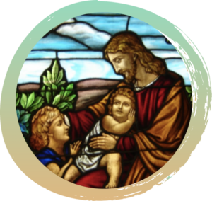 Jesus holding a child in one arm with his other arm extended to touch the head of a woman kneeling beside him