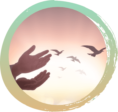 Sunset background with two hands, palms up, displayed on the left side. In the sky, there are several birds flying.