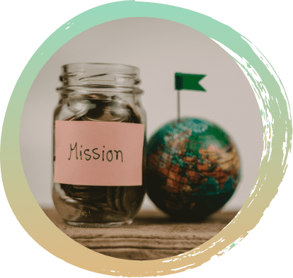 On the left side is a glass jar with coins in it. There is a label on the jar that reads "Mission". On the right side is a small globe with a green flag sticking out of the top